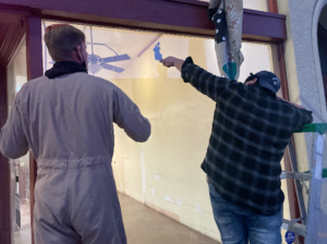 Chris and Frank working on the windows